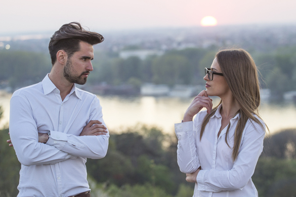 Young couple in conflict in nature - What Should You Do if a Scorpio Man Asks you to Quit Calling Him